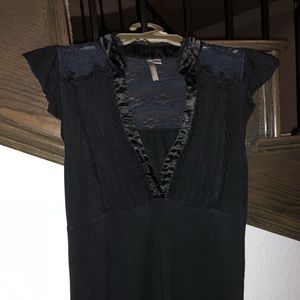 Black collarless blouse